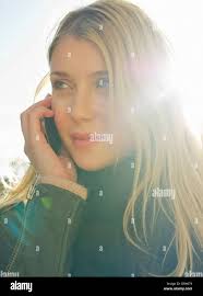 Young blonde woman talking