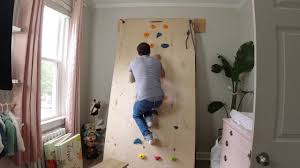 This tutorial walks you through all the steps for a diy climbing wall using the studs in the walls and ceiling for support. Diy Fully Adjustable Climbing Wall Youtube