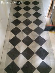 Bethesdastyle Mudroom Hallway Checkered Tile Exquisite Surfaces Soho White Marble Waterworks Piedmo Checkered Floors Checkerboard Floor Cool Rooms