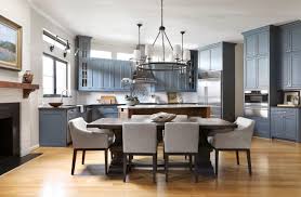 The kitchen, dining room and living room are beautifully distinguished by placing large jute chenille rugs in the center of each area while wood is used as a common material in the three spaces to merge them cohesively. Kitchen Dining Room Combo Ideas 75 Beautiful Pictures August 2021 Houzz