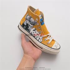 Black And Yellow Converse Chuck Taylors Converse X Kaws X Uniqlo Ut Sesame Street Sunflower Yellow Converse Yellow Converse Converse Chuck Taylor High Top Sneaker