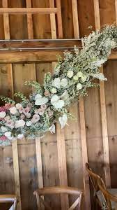 Hanging Modern Flowers At Barn Wedding Video Flower Backdrop Wedding Wedding Backdrop Design Wedding Backdrop