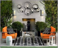 Create a wall sconce candleholder for your favorite scented candle with a bit of weathered white molding and an old silver ladle. 9 Amazing Ideas Of Outdoor Wall Decor Printmeposter Com Blog