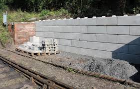Building a retaining wall takes advanced planning and careful layout in order to avoid it becoming a hazard or collapsing. Retaining Walls Elite Precast Concrete