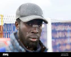 Refugee Adam (last name not given) near a camp in Calais, France Stock  Photo