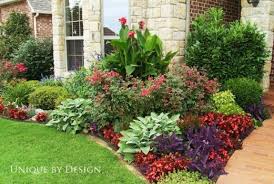 Welcome guests with flower beds that complement your home. Garden Bed Ideas For Front Of House