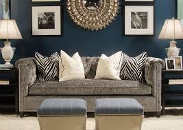 Black wall makes for a lovely backdrop in the spacious, modern living room with gray floor and décor [from: Answering Your Questions Part 2 What Colors Work With Gray Paperblog Teal Walls Living Room Paint Home Living Room