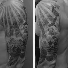 Black And White Sun Ray Tattoos 75 Tree Sleeve Tattoo Designs For Men Tree Sleeve Tattoo Sun Rays Tattoo Tree Sleeve