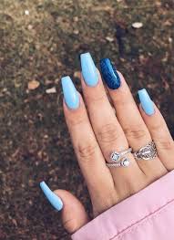 Treasure island we're in love with these glamorous nails, with teal and blue sparkles that shimmer in the light. How To Live With Acrylic Nails 15 Beautiful Acrylic Nail Designs Her Style Code Blue Acrylic Nails Blue Coffin Nails Acrylic Nails