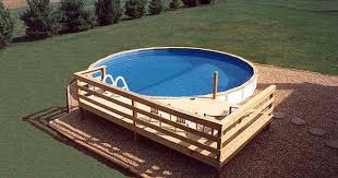 Medallion Pools St Croix Above Ground With Vinyl Siding Partial Wood Deck 2 Backyard Pool Landscaping Pool Landscaping Wood Pool Deck