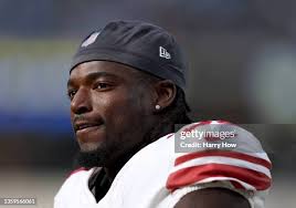 Raymond Johnson III, Tae Crowder, and Leonard Williams of the New... News  Photo