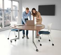 The New Modern Looking Guitar Pick Shape Adds Design To Setting Furniture Business Furniture Conference Room Design