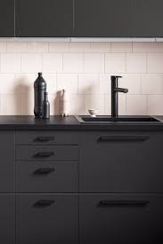 Ikea Just Released The Sleekest Kitchen Cabinets All Made From Recycled Materials Sleek Kitchen Cabinets Sleek Kitchen Black Kitchen Cabinets