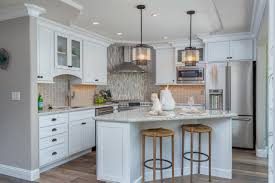 We chose a warm neutral color for the cabinetry and enhanced this warmth. White Kitchen With Gray Countertops Ideas 75 Beautiful Pictures August 2021 Houzz