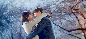 Cars and people move in reverse, and snow falls up into the sky. While You Were Sleeping Kdrama Review Wynnesworld