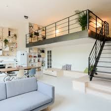 School Teachers Lounge Transformed Into Contemporary Loft Apartment By putting on another level, the entire living area can be expanded while the space under the lofted bed.