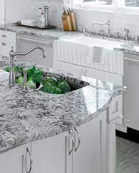 Beautiful white cabinets and white quartz kitchen countertop match with the classic appeal of a white subway tile backsplash. 22 Best Grey Granite Kitchen Countertops Ideas Granite Kitchen Countertops Grey Granite