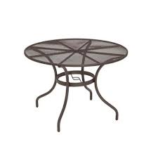 Some tables feature a slot to support a patio umbrella for discreet usage. Umbrella Hole Patio Tables Patio Furniture The Home Depot