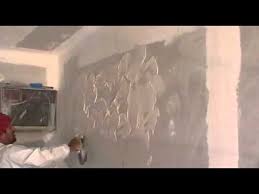 This easy to do texture goes by many names but it's one you can do, even as a novice. How To Do A Skip Trowel Mud Trowel Knockdown Santa Fe Spanish Knockdown Texture Youtube Textured Walls Diy Rustic Wall Wall Painting Techniques
