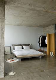 Less Is More Spartan Living The Interior Collective Industrial Bedroom Design Concrete Bedroom Home Bedroom