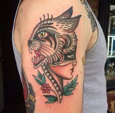 Bobcats have smaller tracks (2) that are often confused with coyote or fox. Traditional Bobcat Head Tattoo On Right Half Sleeve Head Tattoos Half Sleeve Tattoo Sleeve Tattoos