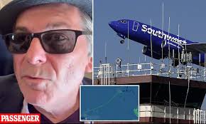 Father catches his son from falling out of Wonderland roller coaster cart