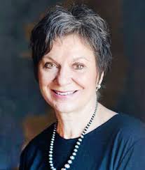 Kalona poodle earns champion dog show title