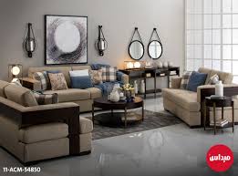 Midas Furniture كنب بلون البيج مع خداديات من نقوشات Facebook