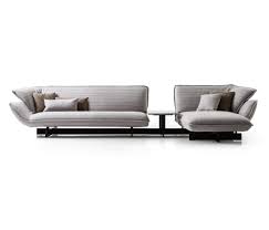 A gentle, soft flowing upholstery is framed by curved bentwood: 550 Beam Sofa System Designer Furniture Architonic