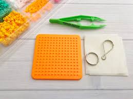 As for the bead colors and sizes mentioned in the patterns, please keep it in mind it is simply a reference, it's not a rule that you must follow. Winnie The Pooh Perler Bead Keychain Mom Does Reviews