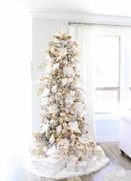 A christmas tree is a decorated tree, usually an evergreen conifer, such as a spruce, pine, or fir, or an artificial tree of similar appearance, associated with the celebration of christmas. Glam White Gold Living Room Christmas Tree Mantel Summer Adams