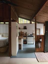 There is a small log under the stairway that supports it. Unplugged A Young Couple S Diy Totally Off The Grid Cabin In The New Hampshire Woods Remodelista