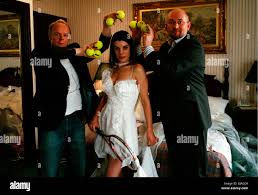 CONFETTI UK 2006 Debbie Isitt Isabelle (MEREDITH MACNEILL) and the Wedding  Planner (VINCENT FRANKLIN, GREGORY HOUGH) Regie: Debbie Isitt Stock Photo