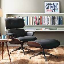 This wooden lounge is decorated with cushion and shelter. Lounge Chairs Buy Designer Lounge Chairs Online In India Urban Ladder
