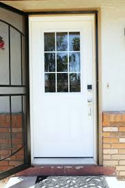 We took ours off since we were replacing our 35 year old hardware. How To Paint A Front Door Without Removing It Classy Clutter