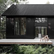 The Contrasting Exterior Of Grand Pic Chalet By Appareilarchitecture Michaudfelix Black House Exterior Architecture House Exterior