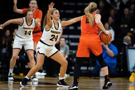 Obama, a hoops fanatic who relishes the annual march madness college basketball tournaments, on saturday cheered on the undefeated princeton women's team that includes his niece leslie robinson as the school's fans chanted four more years.. Women S Basketball Faces A Former Hawkeye On Clemson S Staff The Daily Iowan