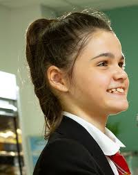 First picture of 'happy and vibrant' girl, 11, who died suddenly after  falling ill at school as teachers pay tribute