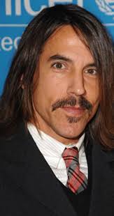 Anthony has dark hair, but has been known to wear it dyed blond. Anthony Kiedis Imdb