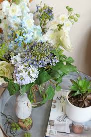 Refusing to wilt and wither, this faux floral arrangement offers a boost of botanical beauty without any upkeep. How To Decorate With Faux Flowers Clean And Scentsible