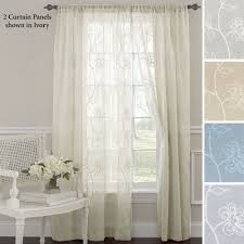 While the idea of this curtain isn't necessarily to block out the sun it looks beautiful. Laura Ashley Frosting Embroidered Sheer Curtain Panel