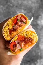 The Ultimate Breakfast Burrito That Has It All Eggs Ham Salsa And Cheese Delicious And Freezer Friendl Breakfast Burritos Recipe Ultimate Breakfast Recipes