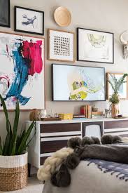 An Amazing Gallery Wall With The Frame Tv Gallery Wall Frames On Wall Wall Frame Design