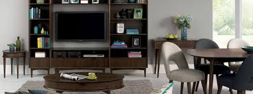 For grand glam, set up contemporary velvet sofas flanked by marble side tables. Walnut Furniture Furniture 123