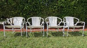 With its beautiful black finish, this rocking chair is uniquely designed to add an elegant look to your patio. Vintage Italian Patio Rockers Rare Set Of 2 4 Available White Orange Slice Strap Rocker Metal Rocking Chairs Outdoor Furniture Italian Patio Mid Century Outdoor Furniture Metal Rocking Chair
