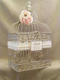 This black and copper cage has been adorned with burlap ribbon bows, a burned heart initials charm, and a burned antiqued cards sign. Wedding Card Box Champagne Birdcage Pearls Bird Cage Wedding Card Holder Elegant Gold Wedding Card Holder Card Box Wedding Wedding Cards