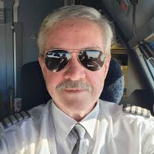 How is SpaceX Cargo Dragon capable of changing its trajectory during  atmospheric reentry?