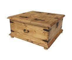 These classic trunk coffee tables not only boost the style factor in your space—they also serve as a spot for storing everything from reading material to throw blankets. Double Trunk Coffee Table Chocolate Cen 009 Dirt Road Rustics Furniture And Home Decor