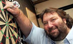 Andy fordham kisses the trophy after beating mervyn king in the final of the bdo lakeside world darts championships in 2004. Vp37vjojstcfum