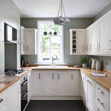 Be creative with your space. White And Sage Green Country Kitchen Decorating Ideal Home Green Country Kitchen Kitchen Design Small Kitchen Layout